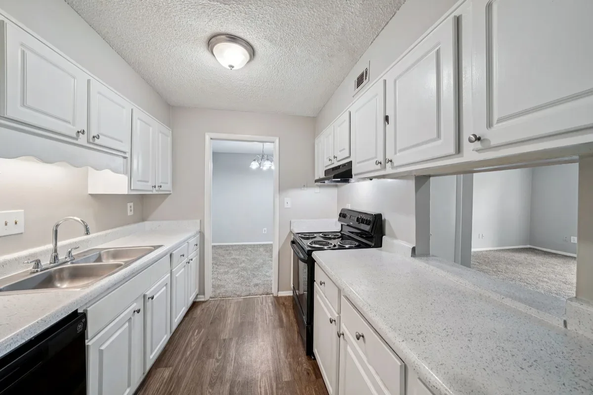 Kitchen with chandelier and alternate view at Hills at Hoover