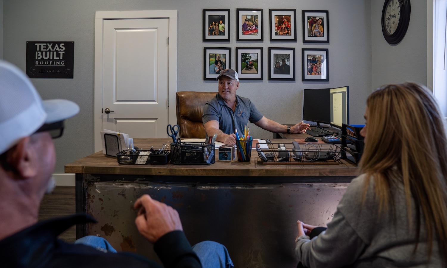 Owner Lee working with clients