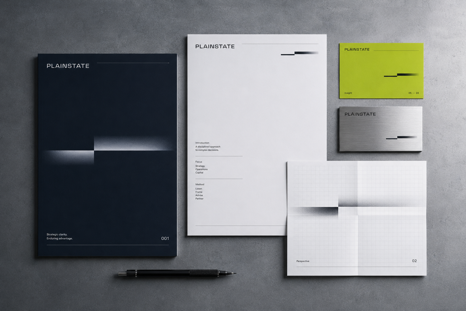 Minimalist PLAINSTATE branded stationery set including folder, papers, business cards, and pen arranged on gray surface.