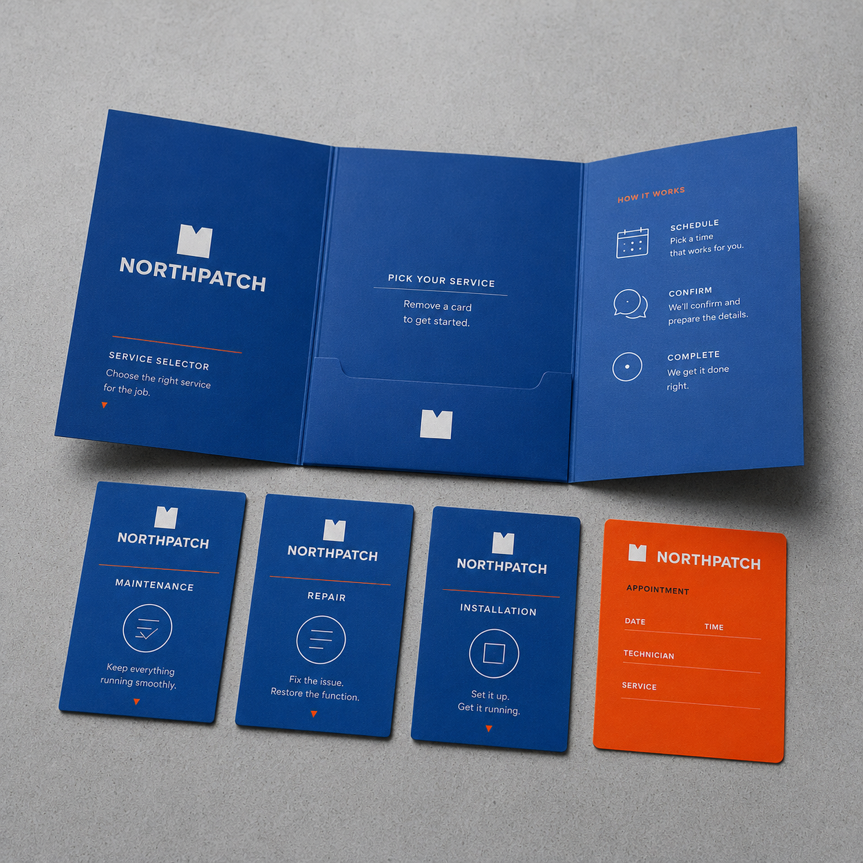 Northpatch blue brochure with service selector cards for maintenance, repair, installation, and an orange appointment card.