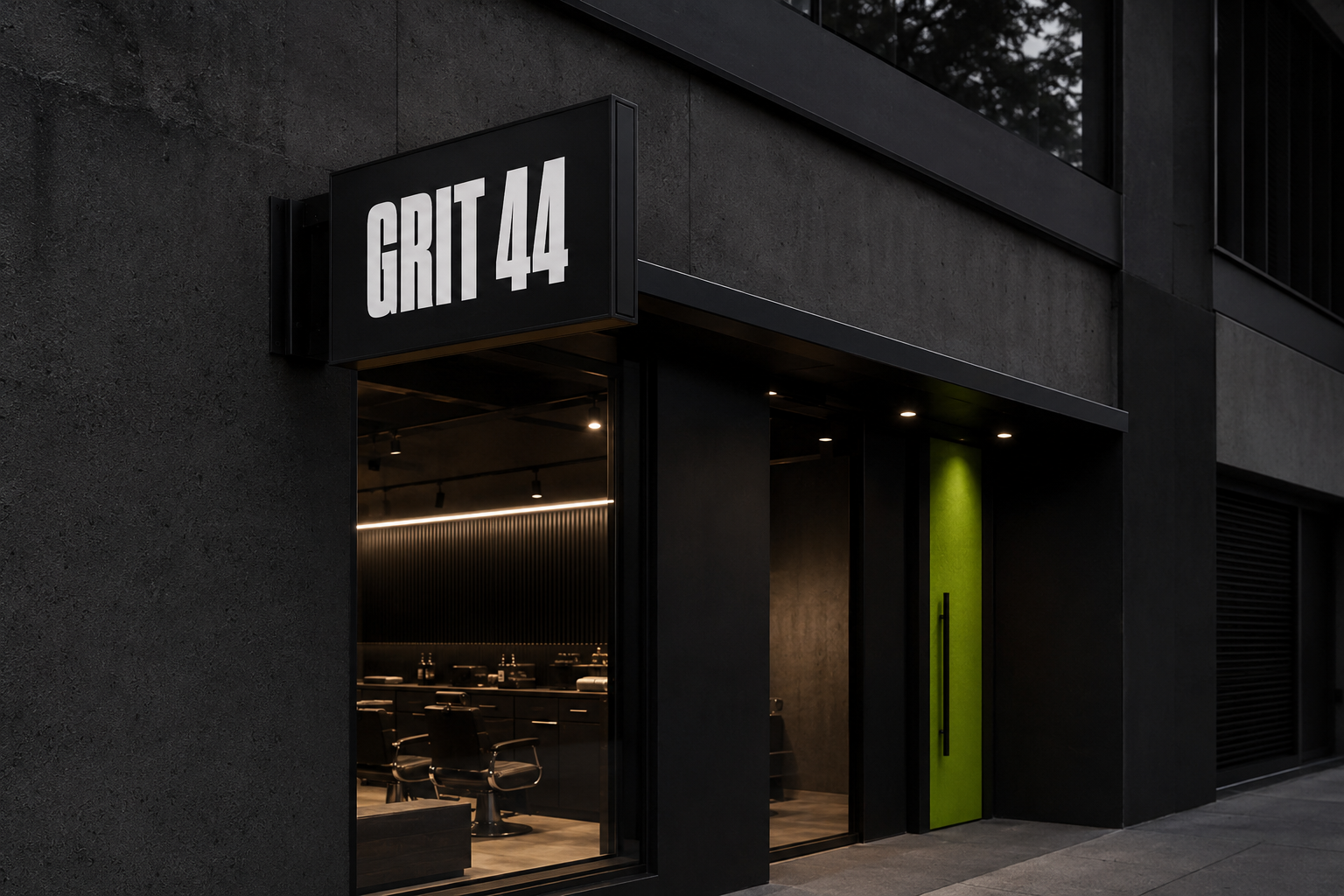 Exterior of dark modern barbershop GRIT 44 with black chairs and a bright green door panel.