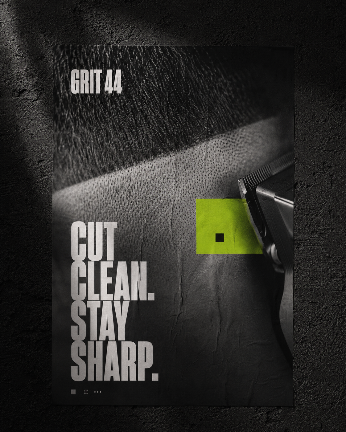 Black and white photo of a close-cut hair fade with electric trimmers, text reads Cut Clean Stay Sharp.