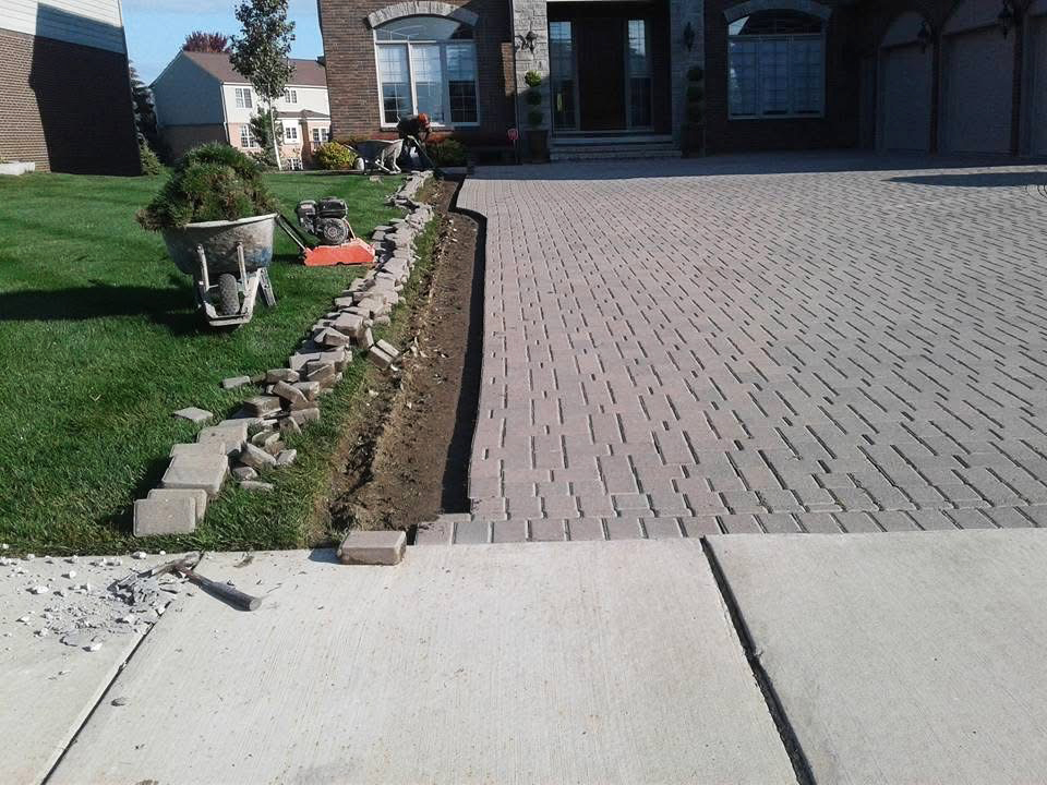 Heritage landscape Brick paver driveway installation project.
