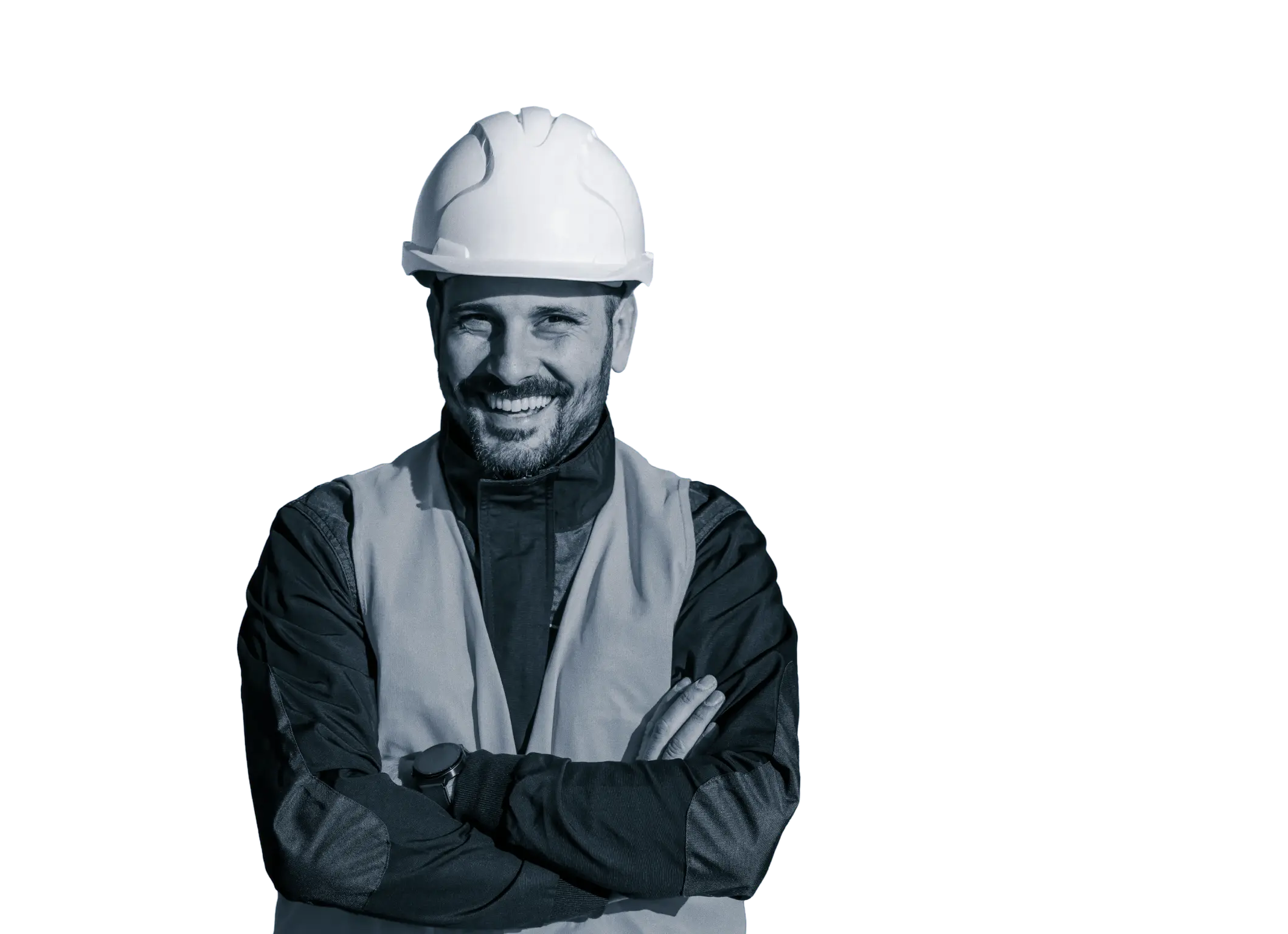 Smiling construction worker wearing a white hard hat and reflective safety vest with arms crossed.
