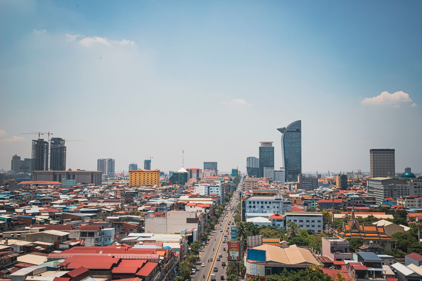 Aerial view of the Phnom Penh skyline with new towers rising above the city blocks