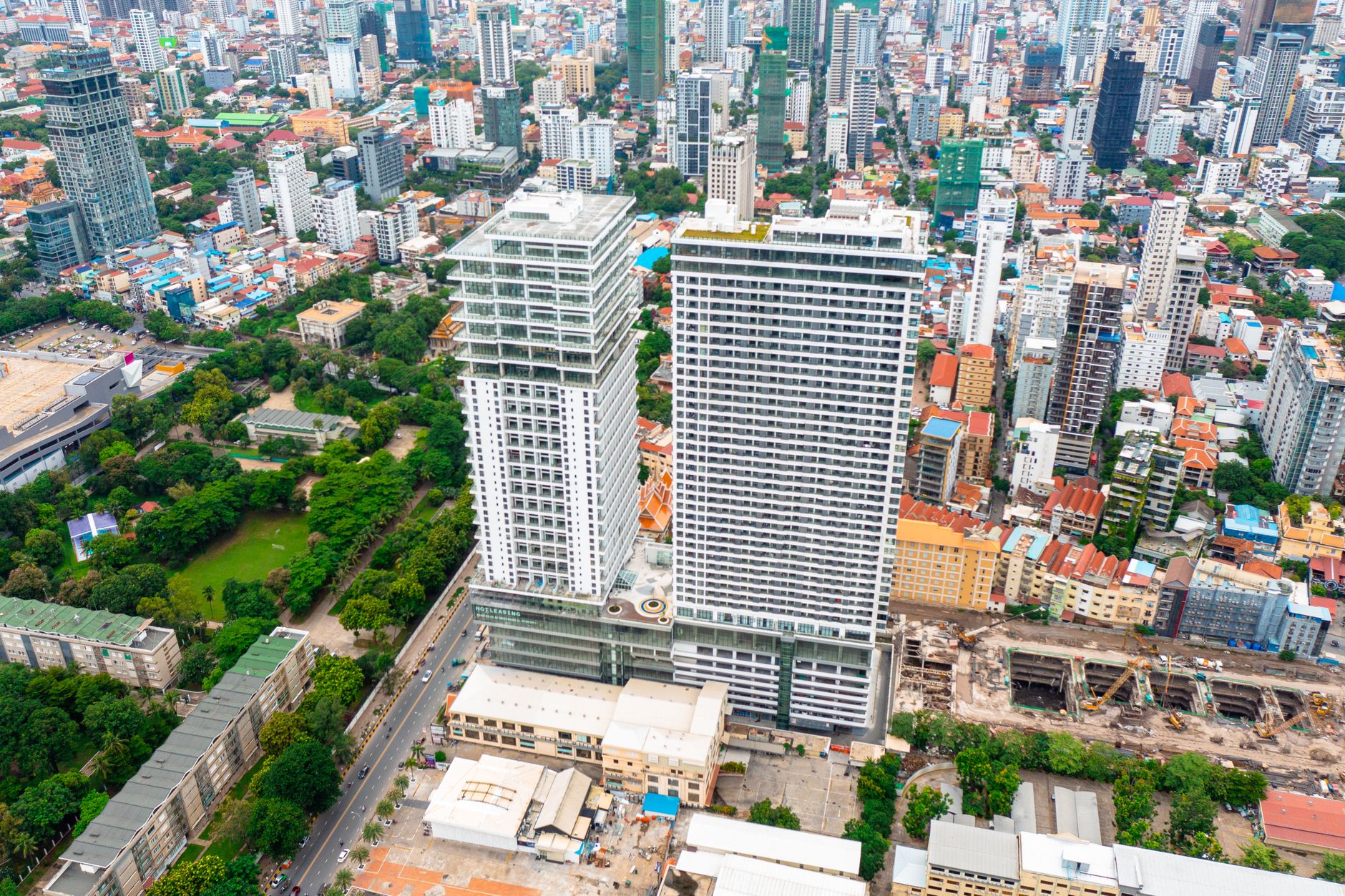 Two newly built condominium towers rising above central Phnom Penh's skyline