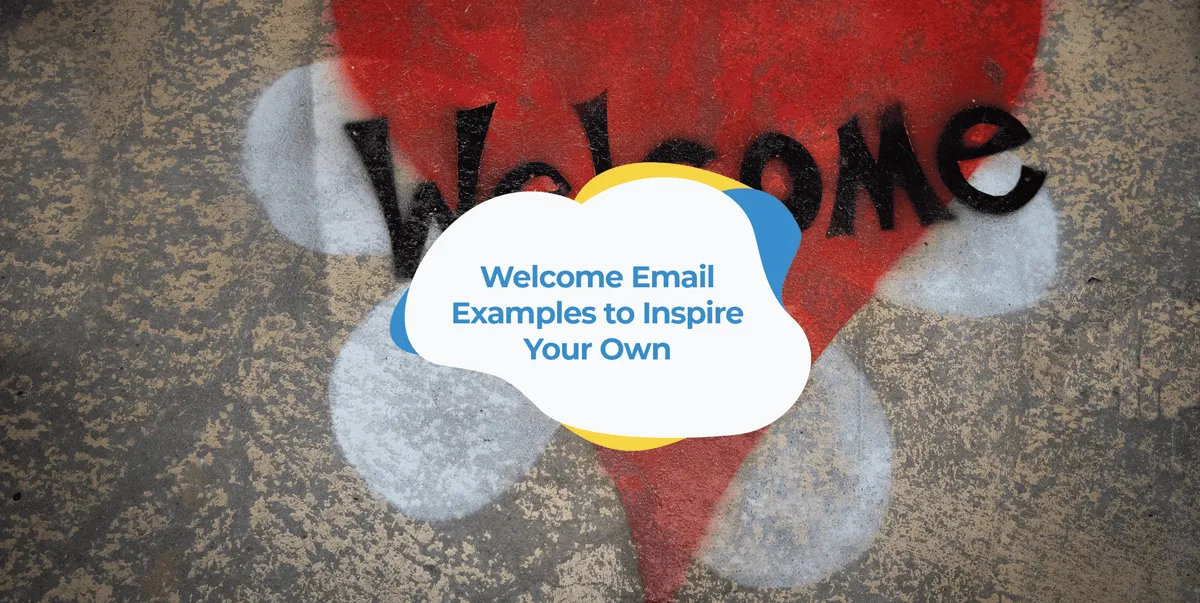 Red heart-shaped doormat with the word Welcome on a stone floor.