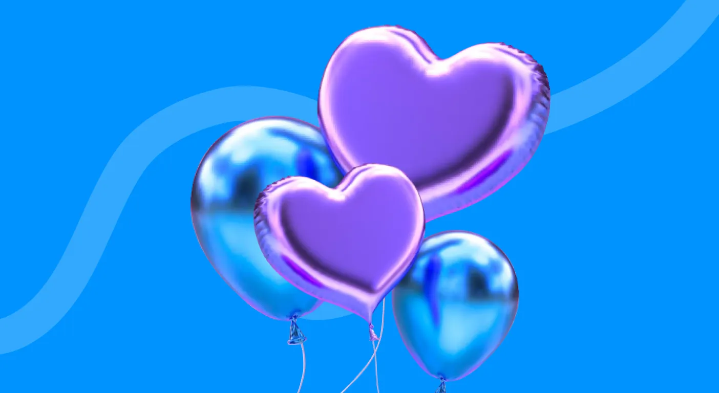 Purple and blue foil heart balloons floating against a blue background.