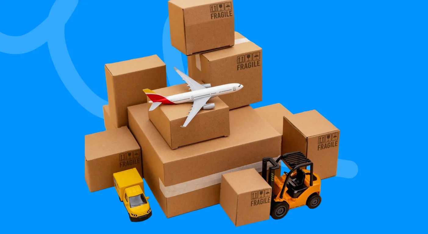 Stack of cardboard parcels with a model plane, forklift and delivery van.