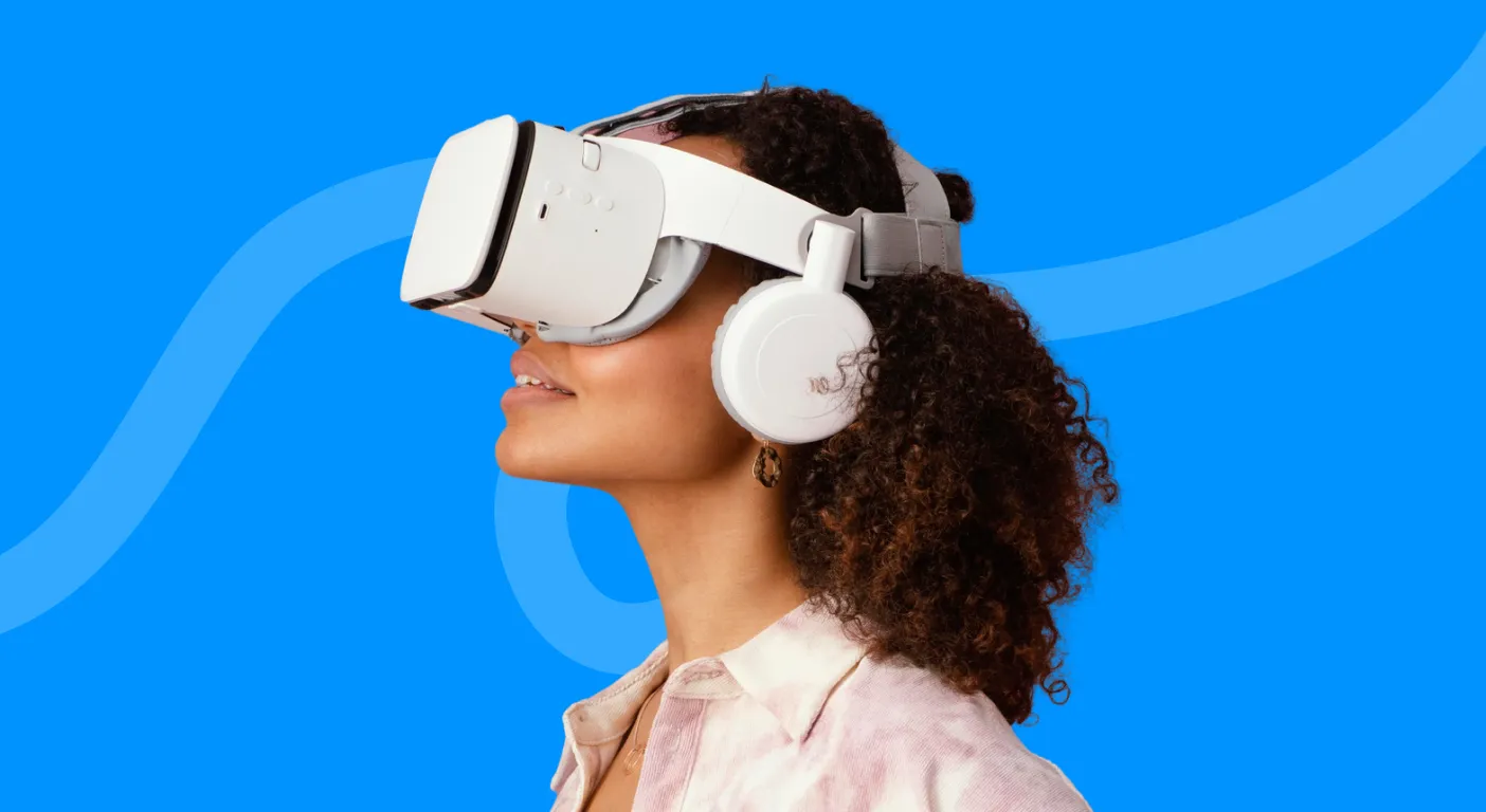Woman with curly hair wearing a white virtual reality headset.