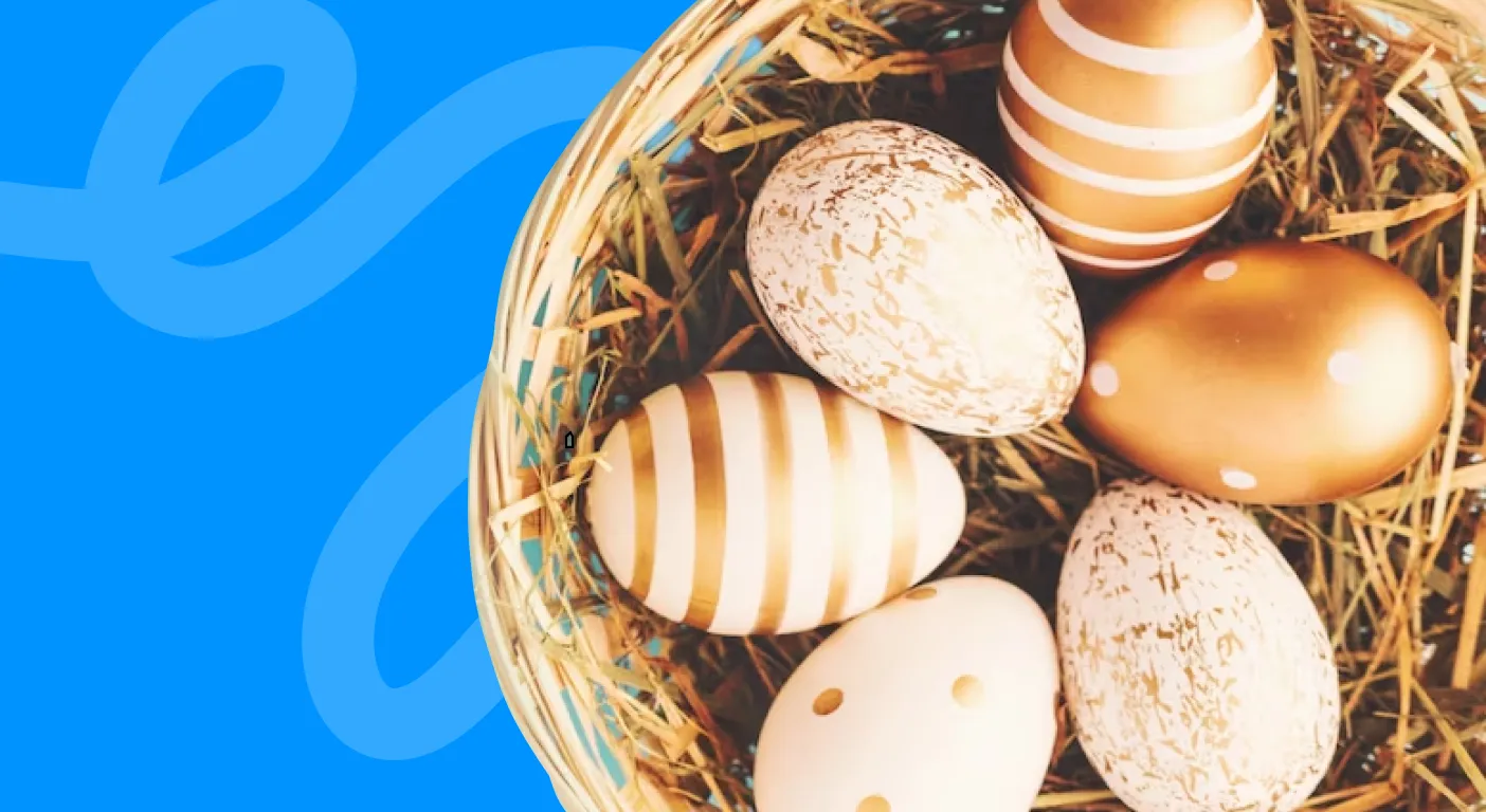 Basket of gold and cream painted Easter eggs nestled in straw.