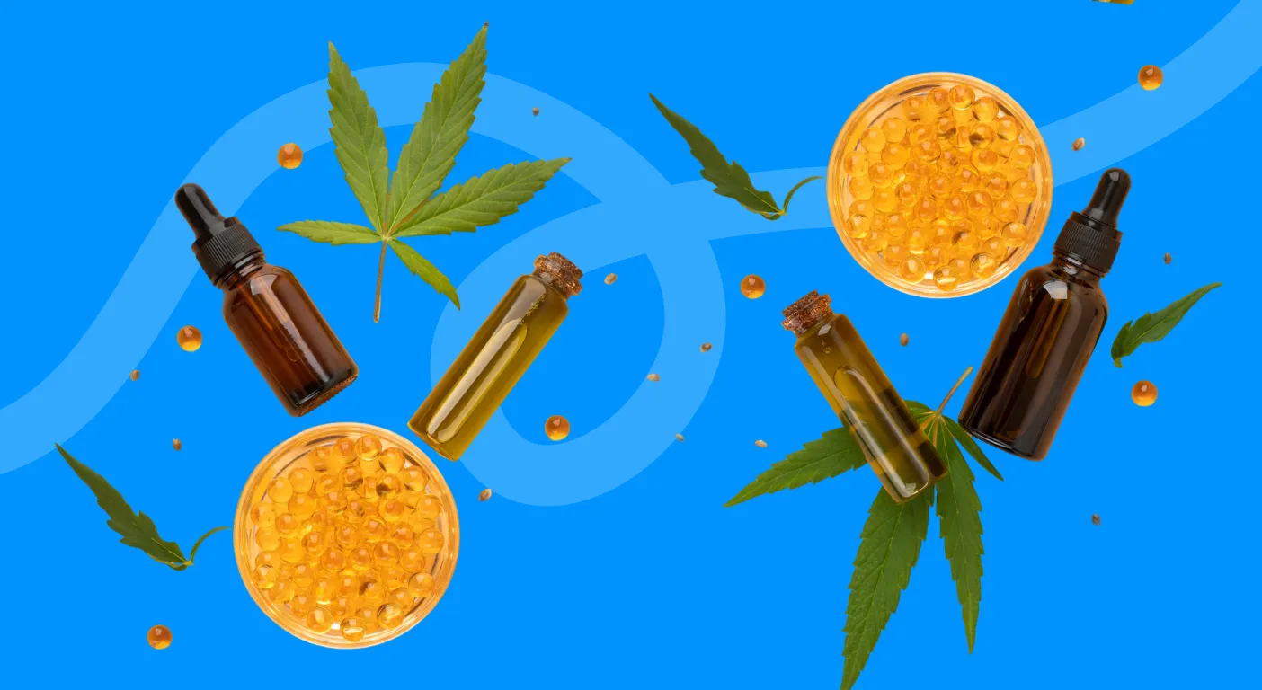 Amber dropper bottles and jars of CBD oil surrounded by hemp leaves.