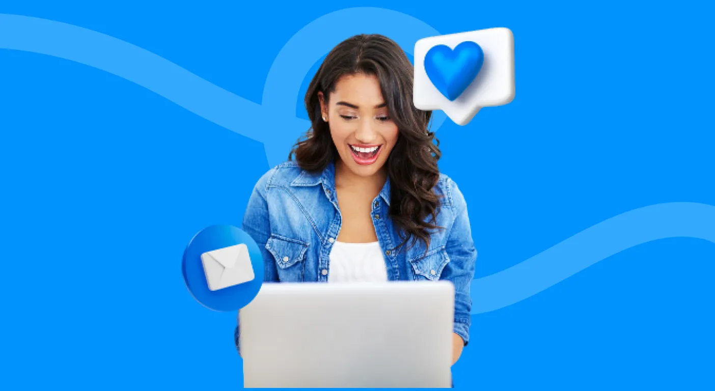 Woman smiling at her laptop as heart and envelope icons pop out, planning Valentine's Day email campaigns.