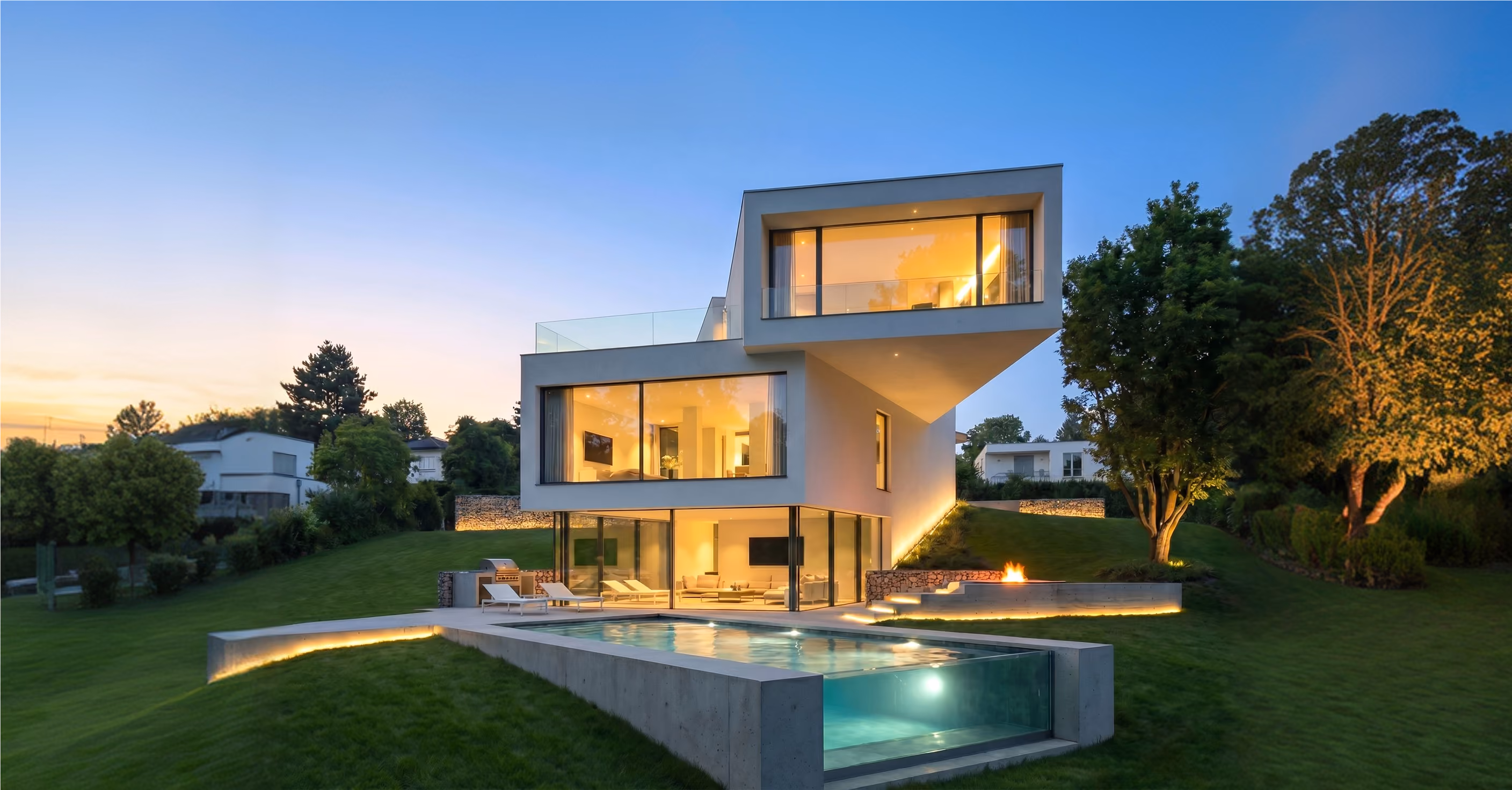 GFK moderne Architektenvilla mit Pool in der Dämmerung