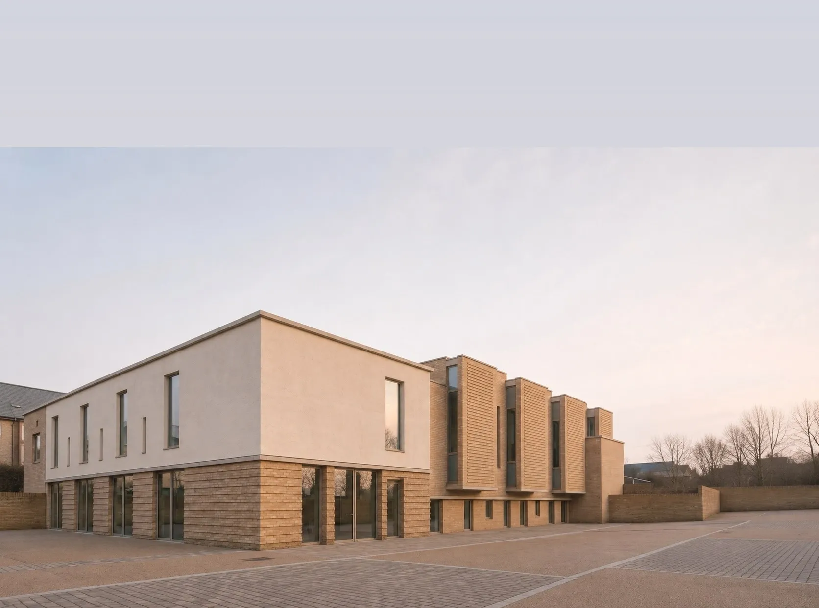 Masterplanned campus buildings around a landscaped courtyard
