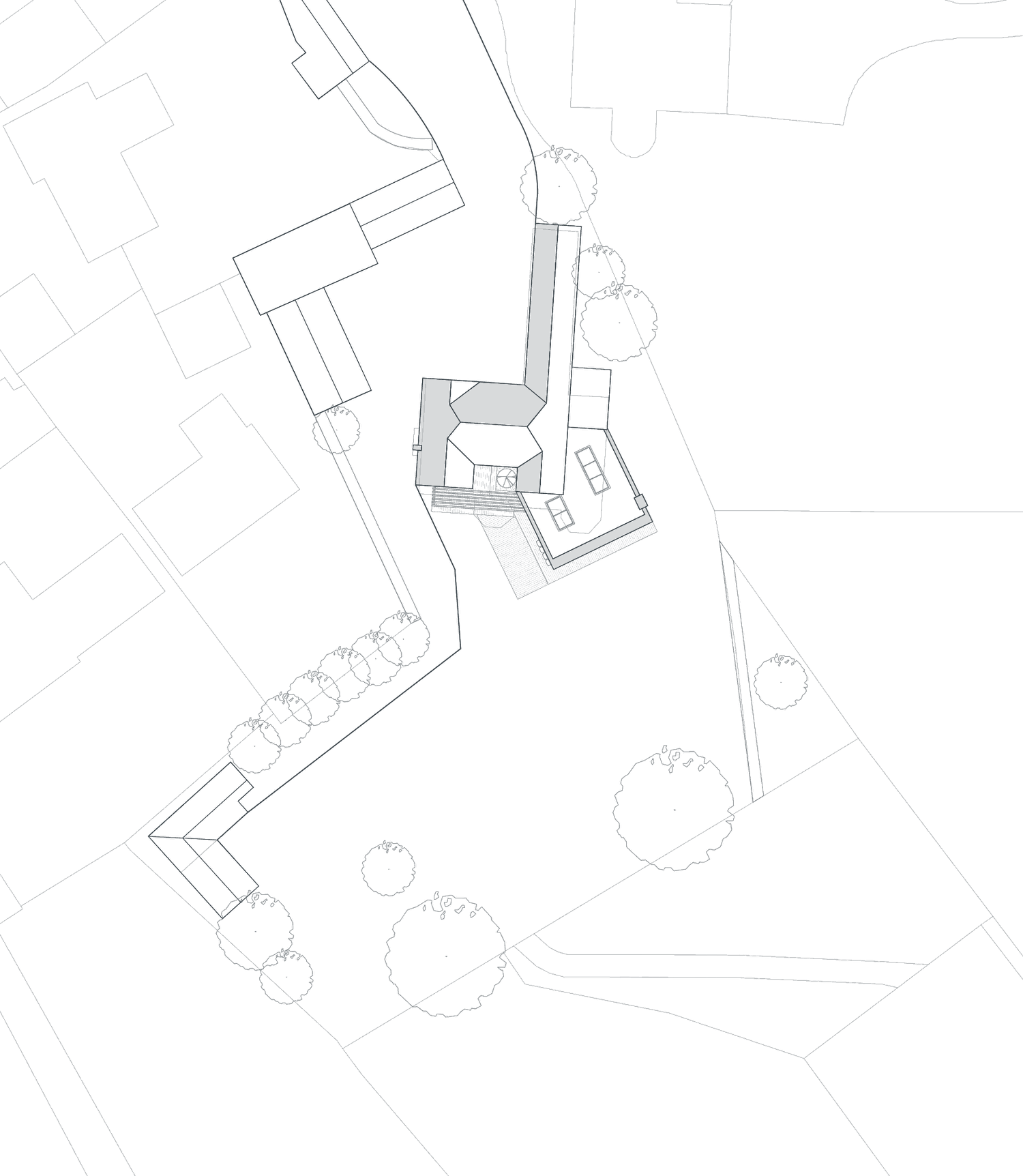 Rickett Architects proposed site plan for the house on Ashlawn Road, Rugby: the angled single-storey extension set into the rear of the plot, with the side vehicle access to the rear kept clear and mature trees retained around the boundary