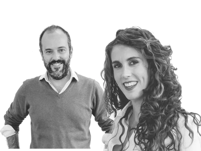 Aida and Alfonso, two of the practice's ARB-registered architects, photographed in the studio.