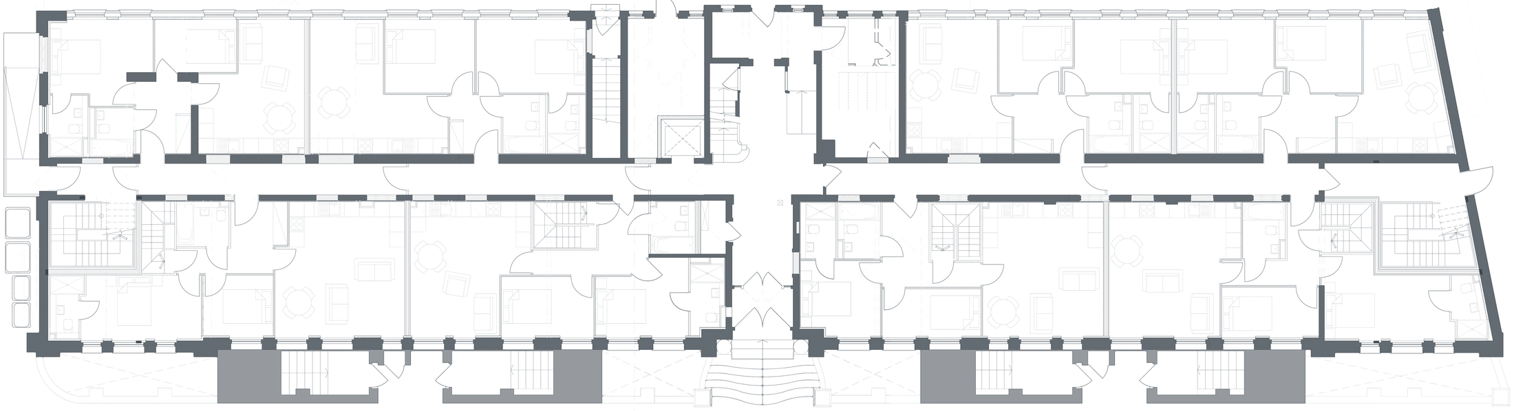 Rickett Architects proposed ground floor plan of Block B, the locally listed 1906 Former Challenge Cycle Works conversion, Foleshill Road, Coventry: the full long building, apartments worked into the retained shell with new cores and stairs around the central entrance