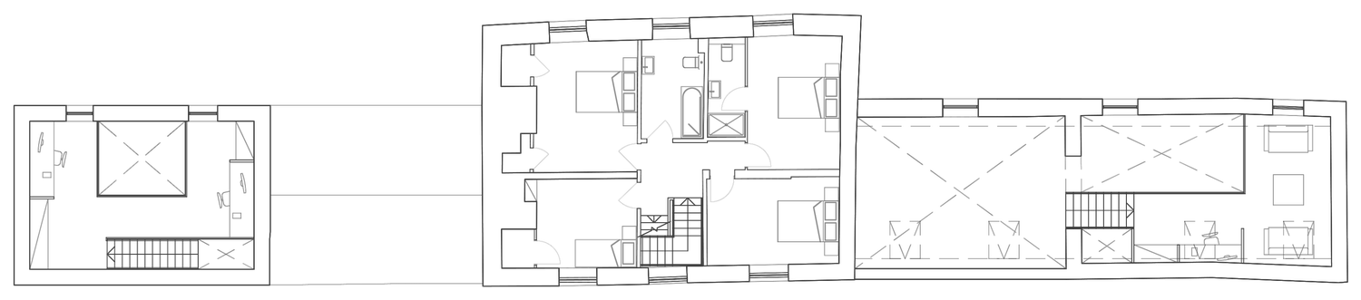 Rickett Architects proposed first floor plan for Barby Wood Farmhouse: bedrooms over the farmhouse, with the converted outbuildings providing further rooms and mezzanine spaces above the cinema room and above the grain barn
