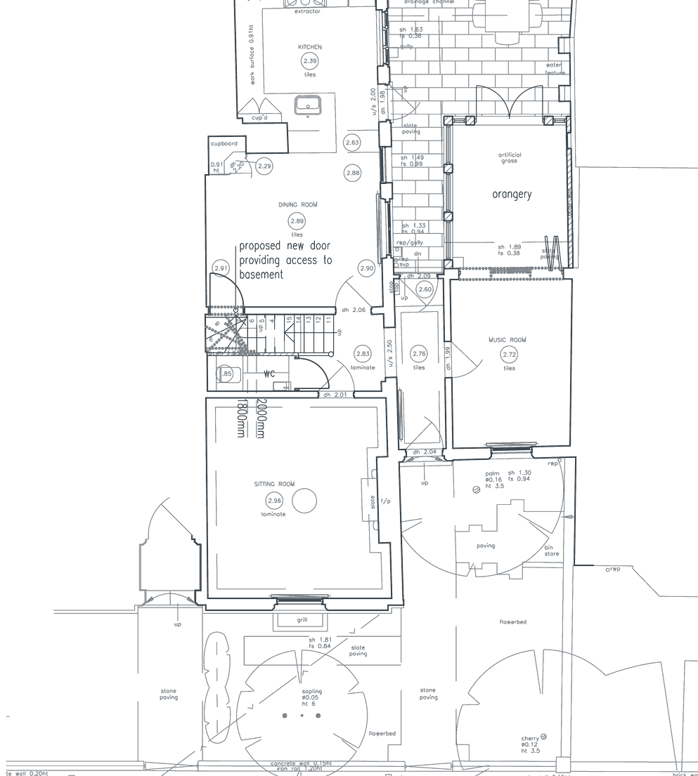 Rickett Architects proposed ground floor plan of a Grade II listed Regency house in Royal Leamington Spa: the new orangery opening off the music room to the garden, a kitchen and dining room, a new ground-floor WC beside the staircase, and the re-planned cellar stair reached from the dining room