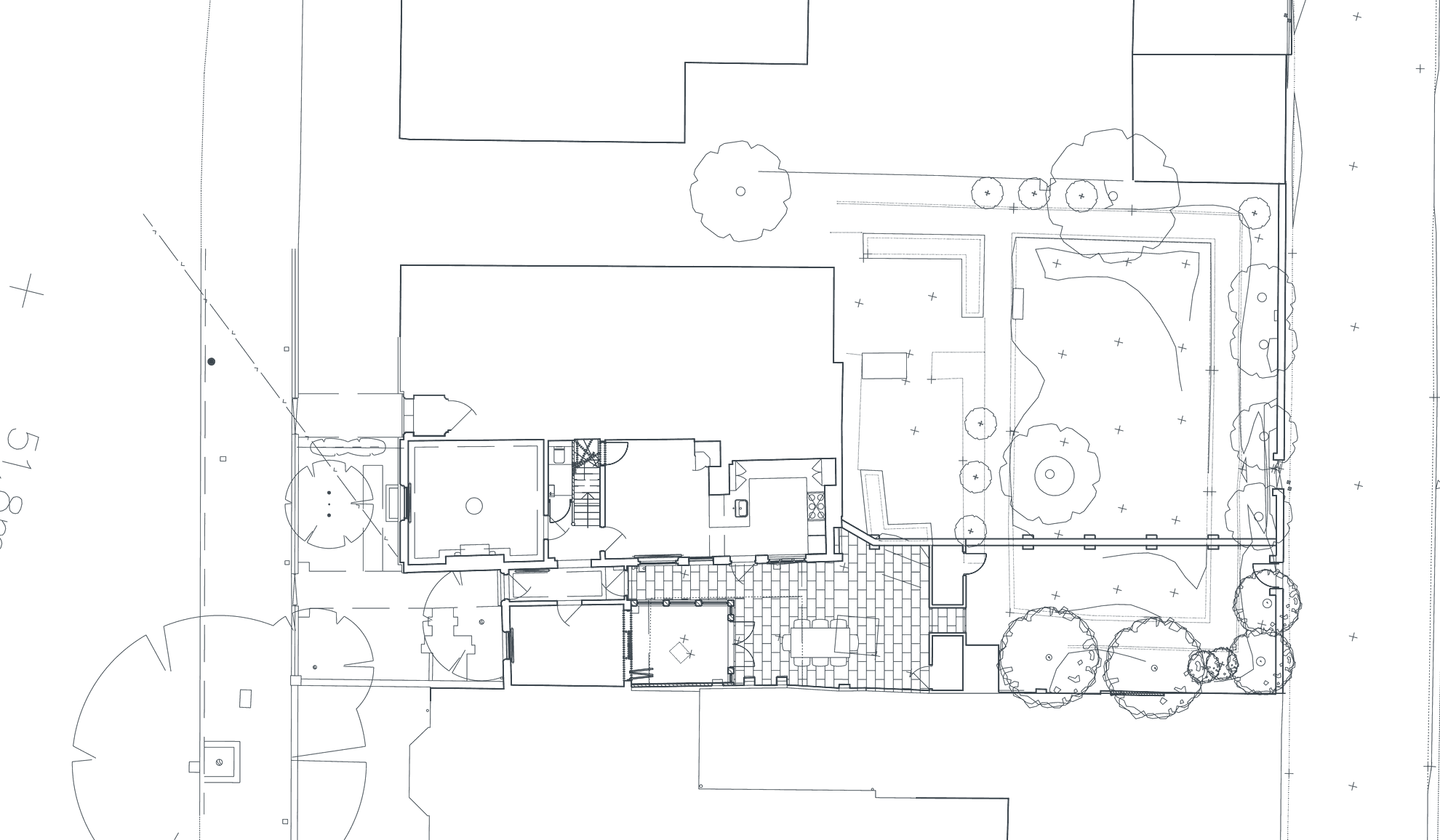 Rickett Architects proposed site plan for a Grade II listed Regency house in Royal Leamington Spa, shown rotated onto its side: the house at one end with its rear courtyard and paving, the long garden running away from it planted with mature trees, and the new boundary wall enclosing the enlarged garden at the far end
