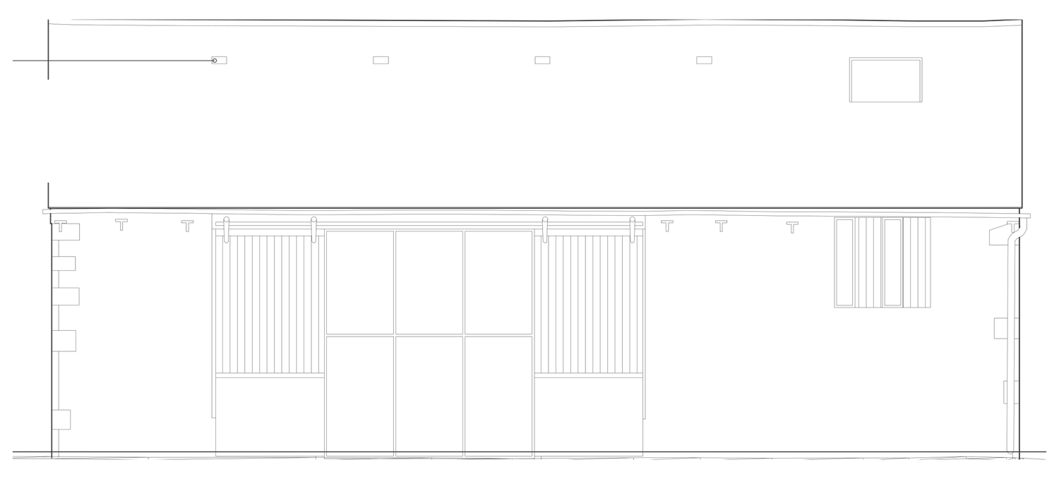 Rickett Architects drawing of the south elevation as consented: the central opening reinstated with full-height glazing behind two sliding timber screens, a first-floor window group at the east end, and one new slot window taking its proportions from the blocked-up slots