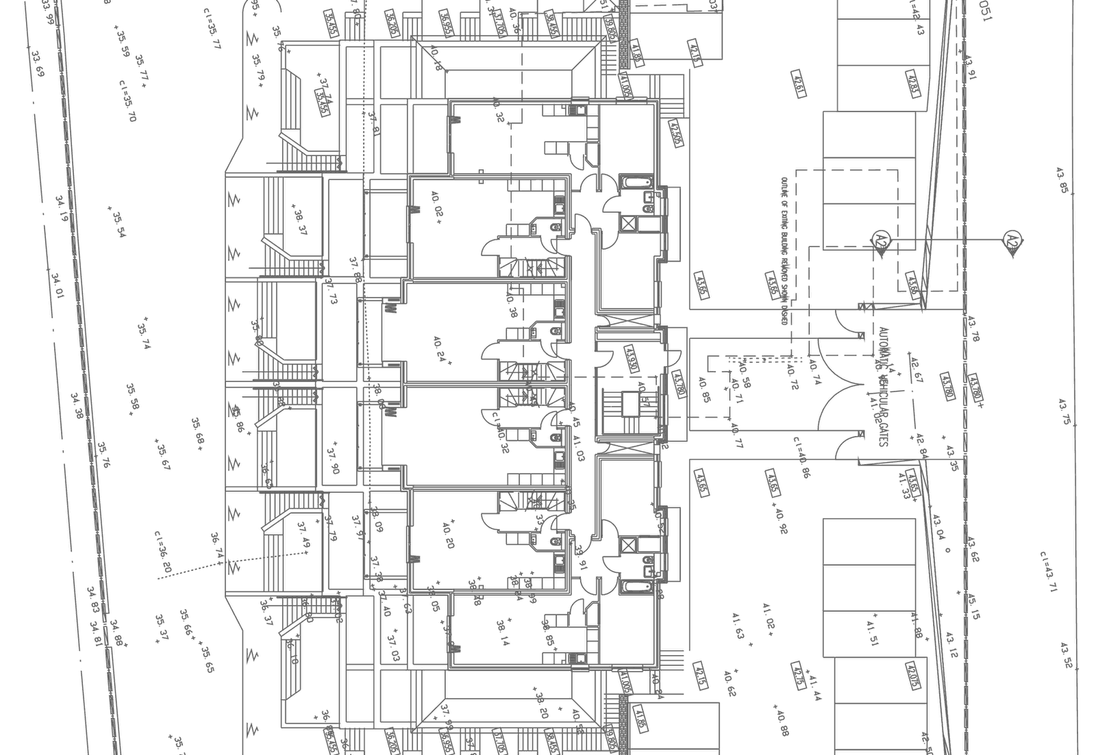 Rickett Architects site layout for Ocean Point, drawing s-001: the apartment building with its seaward terraces towards the cliff edge, and the entrance court, gates and parking off Saunton Road on the landward side