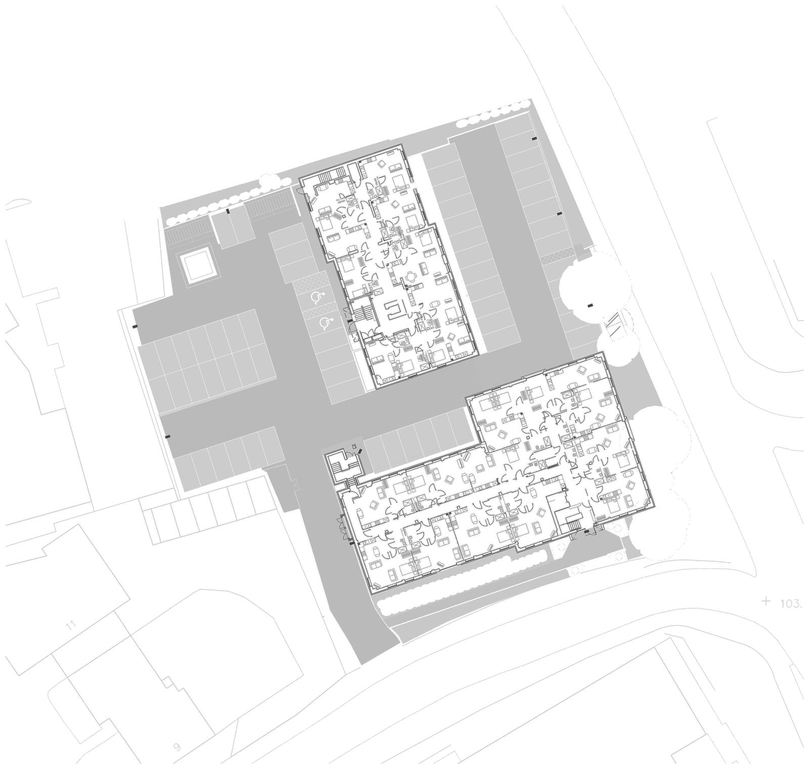 Rickett Architects site plan for Sheldon Court, Birmingham: the North and South office blocks drawn as apartment layouts with internal walls, kitchens and bathrooms set out, the retained surface car park and its bays between them, and the surrounding roads and neighbouring buildings drawn faintly around the parcel