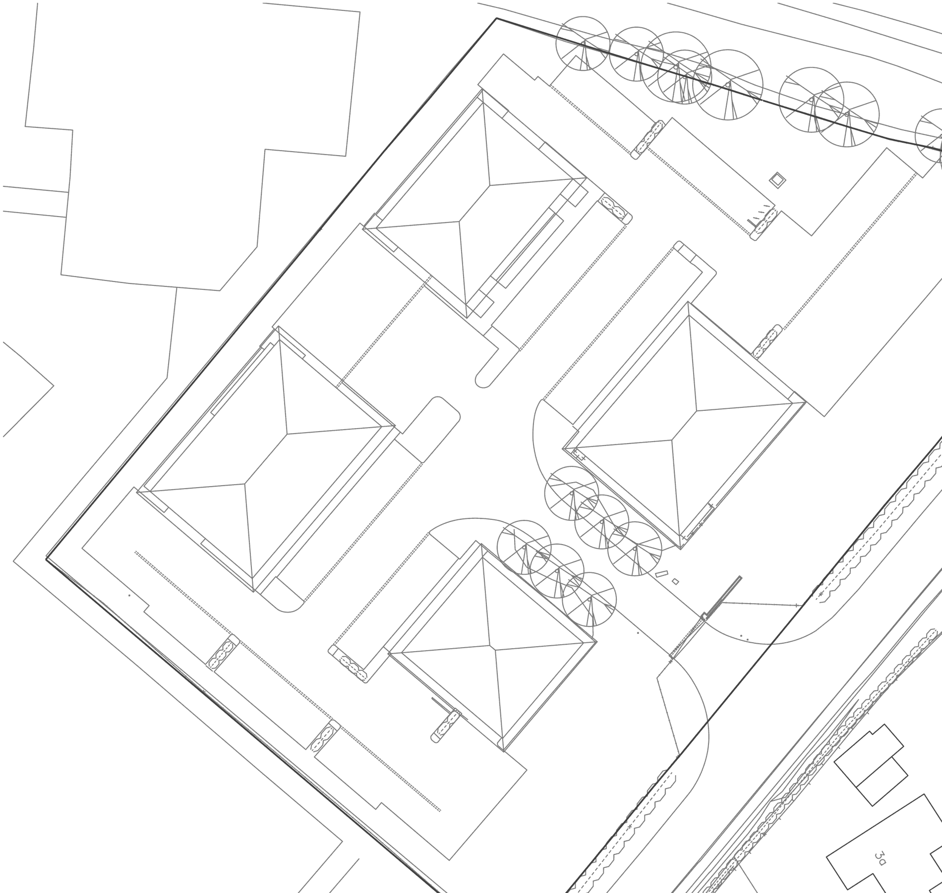 Existing site plan of Avonbury Business Park: four two-storey buildings drawn with their hipped roofs inside the red site boundary, parking bays and access roads between them, a line of trees along the north-east boundary, a hedge to the south-east, and neighbouring houses drawn faintly beyond