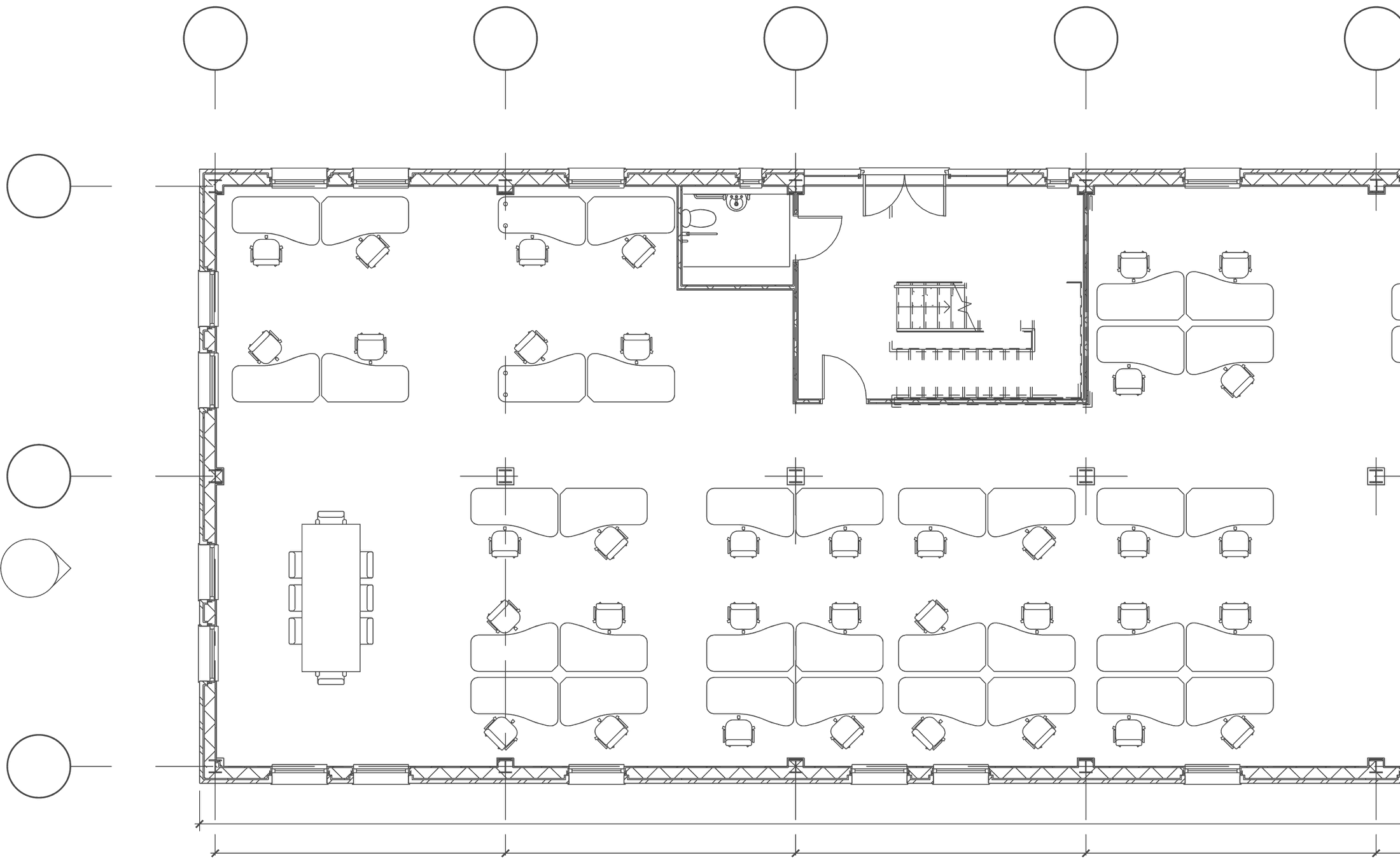 Consented ground floor plan of the Avonbury office: a long shallow rectangle with clusters of desks and chairs ranged along both window walls, a meeting table at the left-hand end, and a central core containing the stair, kitchen, reception and WCs, set out on a regular structural grid