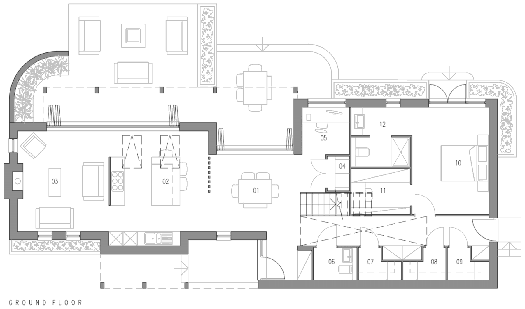Ground floor plan of the smaller house at Timbercombe Lane: an open dining, kitchen and living space running across the western half, with a study, utility and stores in the centre, and the principal bedroom with its dressing room and en-suite at the eastern end