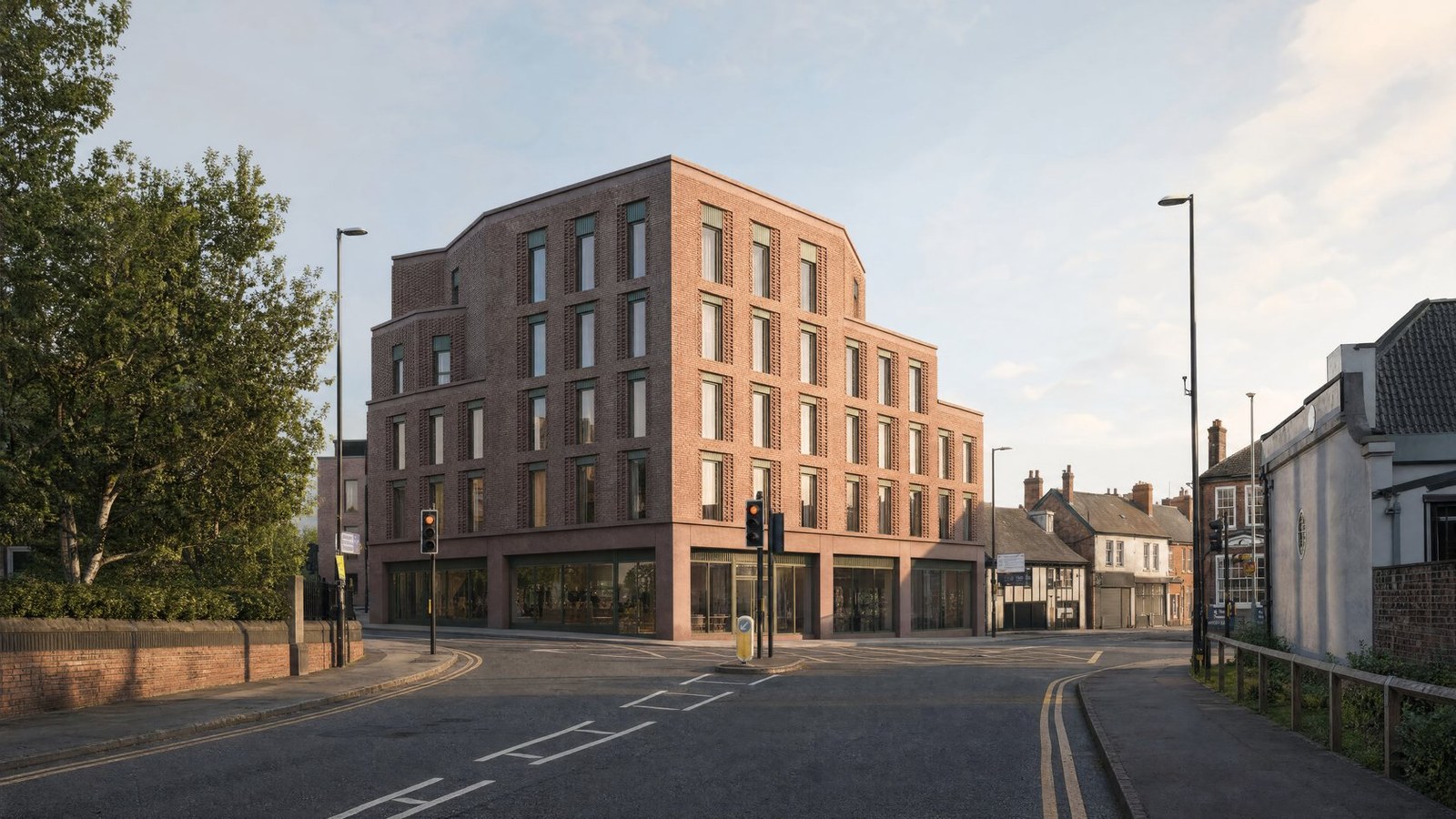 A Rickett Architects visualisation of the tested massing: a stepped brick apartment building addressing the main road and stepping down to the canal behind