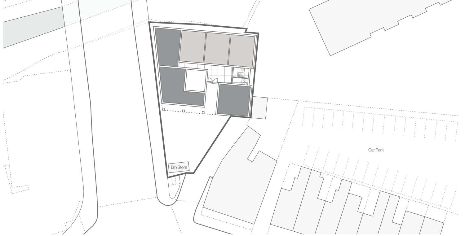 The feasibility site layout: the apartment footprint set on a wedge-shaped plot between the main road and the canal, with resident parking proposed in a nearby car park off the plot