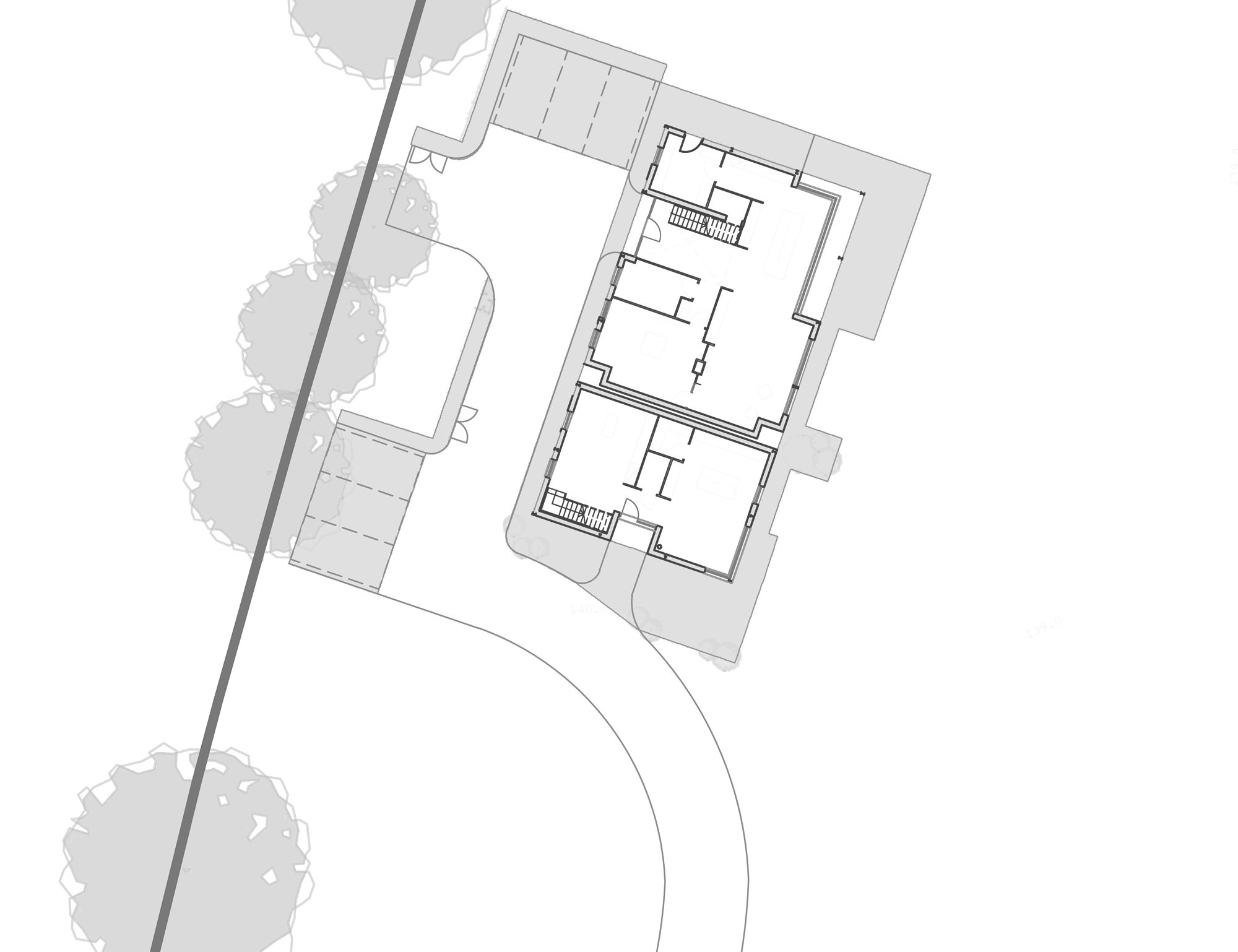 Rickett Architects site plan for Green Gate Barns, Earlswood: the converted barn drawn as a single footprint containing two homes with their internal walls, the residential curtilage shaded tight around it, a parking court to the north west, the existing access curving away to the south, the plot boundary running diagonally past, and existing trees along it