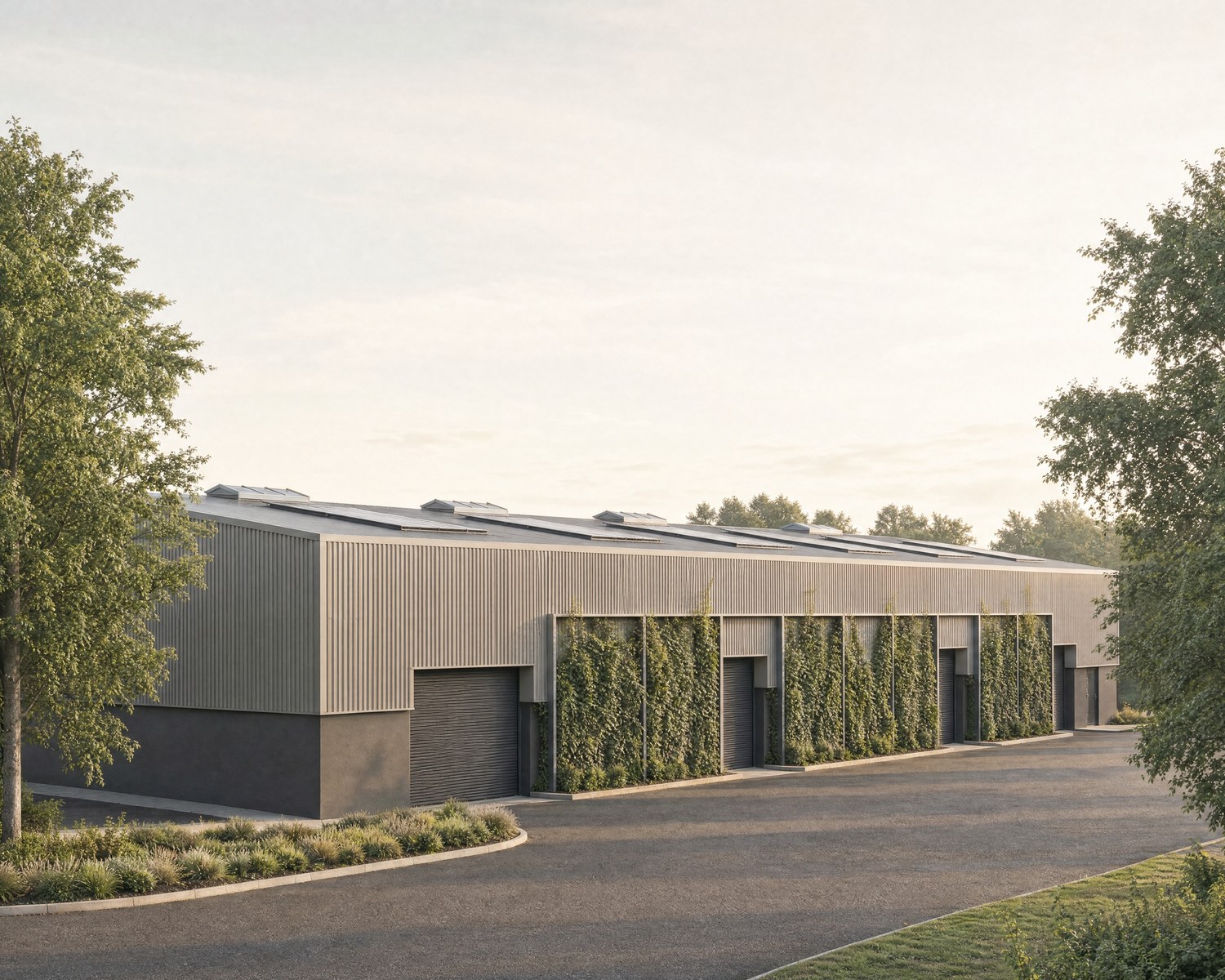 Visualisation of the consented warehouse extension at Aldridge Road, Perry Barr: roller-shutter loading doors alternating with tall planted green-wall bays along the profiled metal frontage, seen from the new access road.