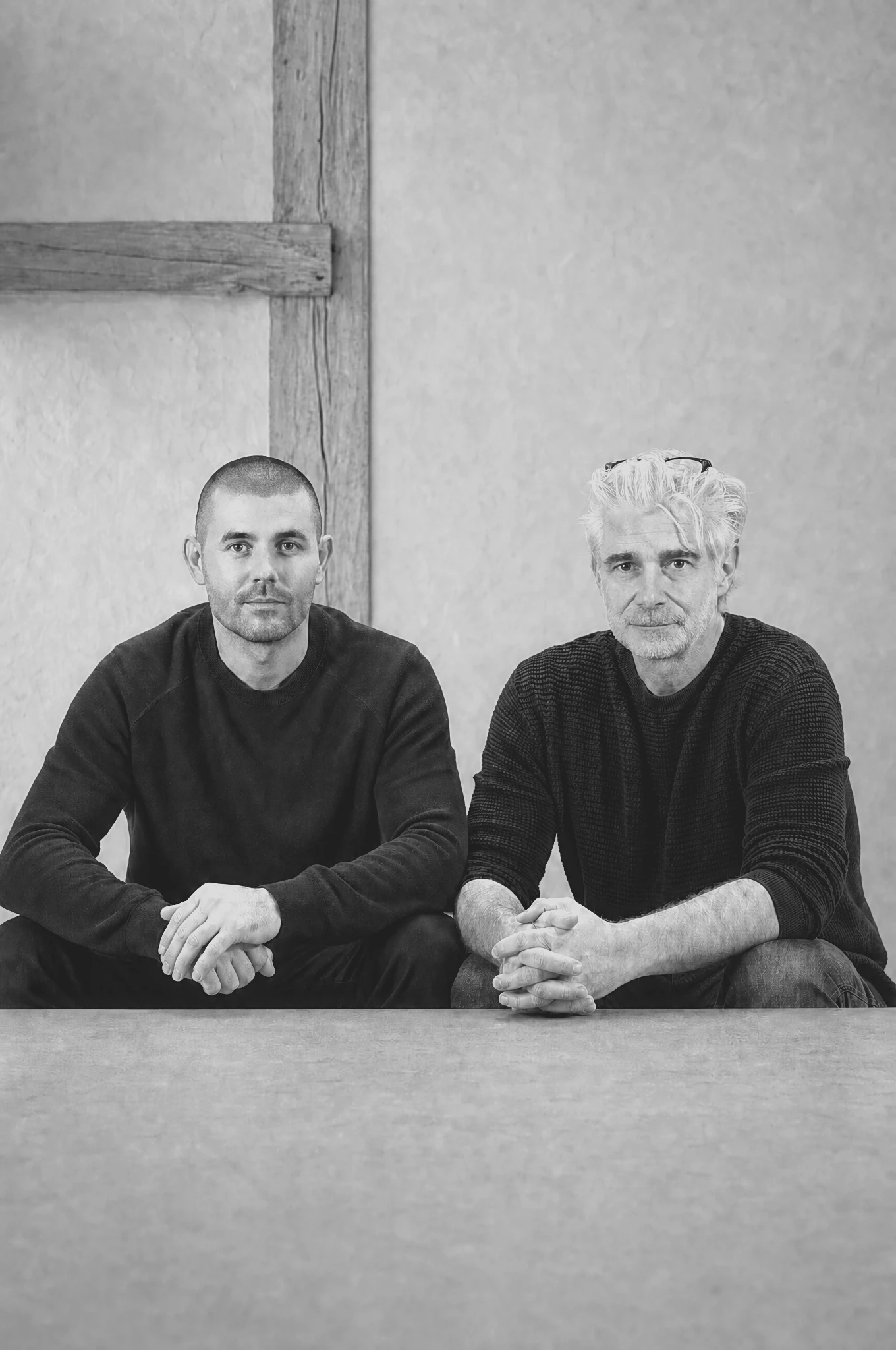 Rickett Architects directors Paul Watt and Dan Rickett, seated in the practice's converted-barn studio