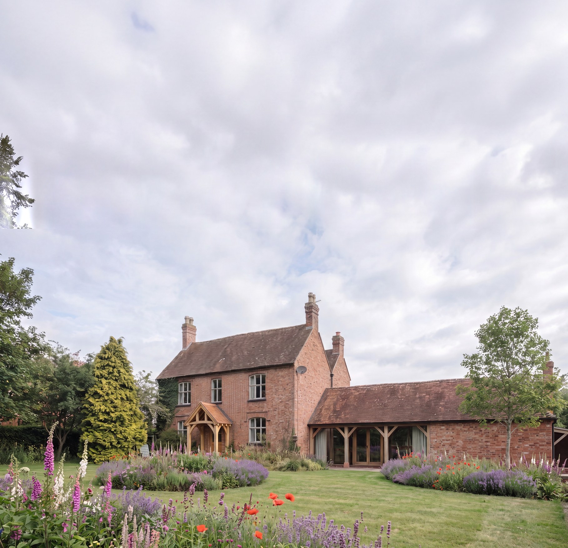 Visualisation of the consented scheme at Cannings Farm, Norton Lindsey: the retained brick farmhouse with its new oak porch, beside the converted farm building behind an oak loggia.