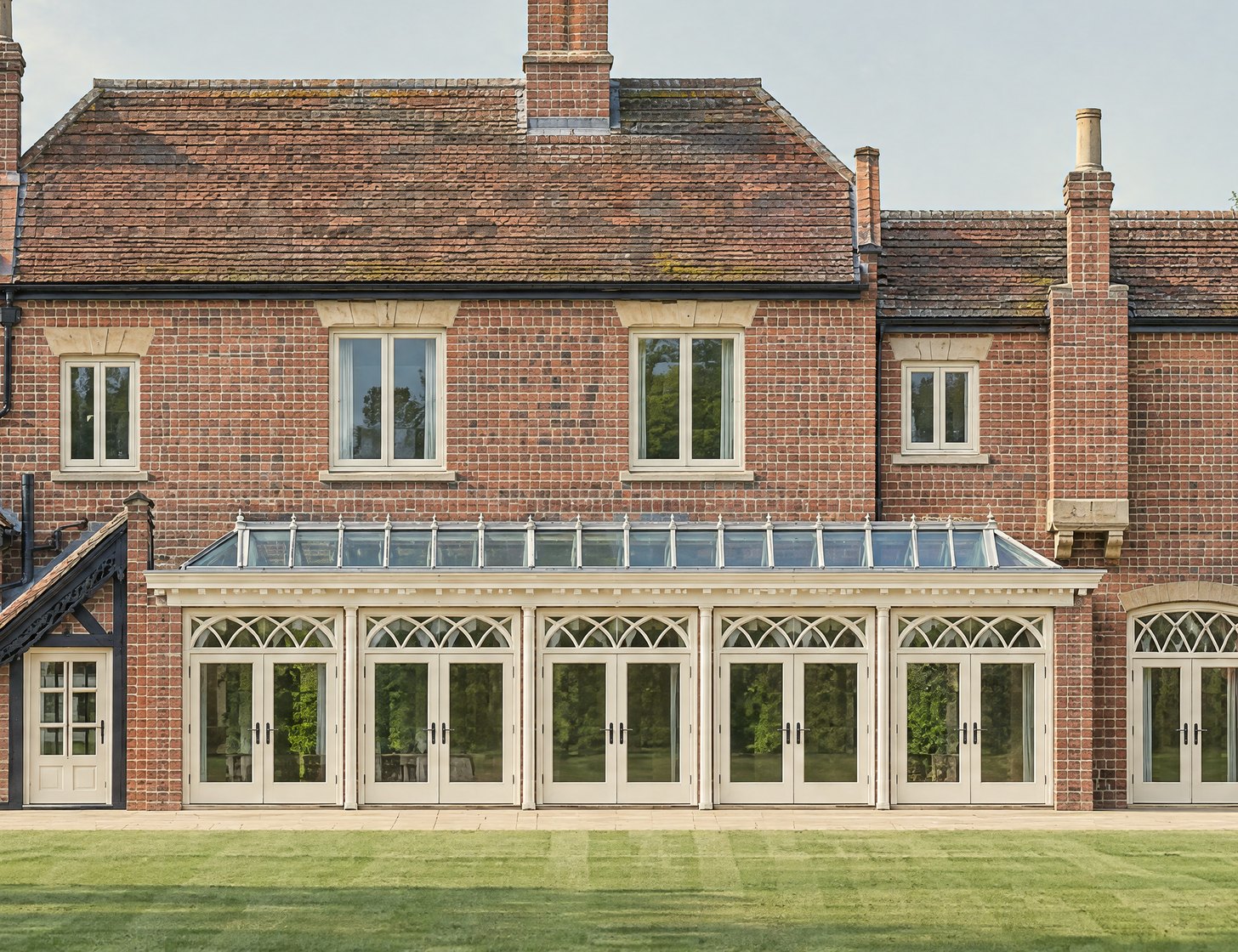 Closer part of the visualisation: the orangery's carved cornice, brick piers and glazed roof