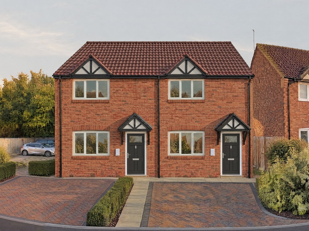 A closer view of the visualisation: dark front doors under gabled canopies and block-paved parking