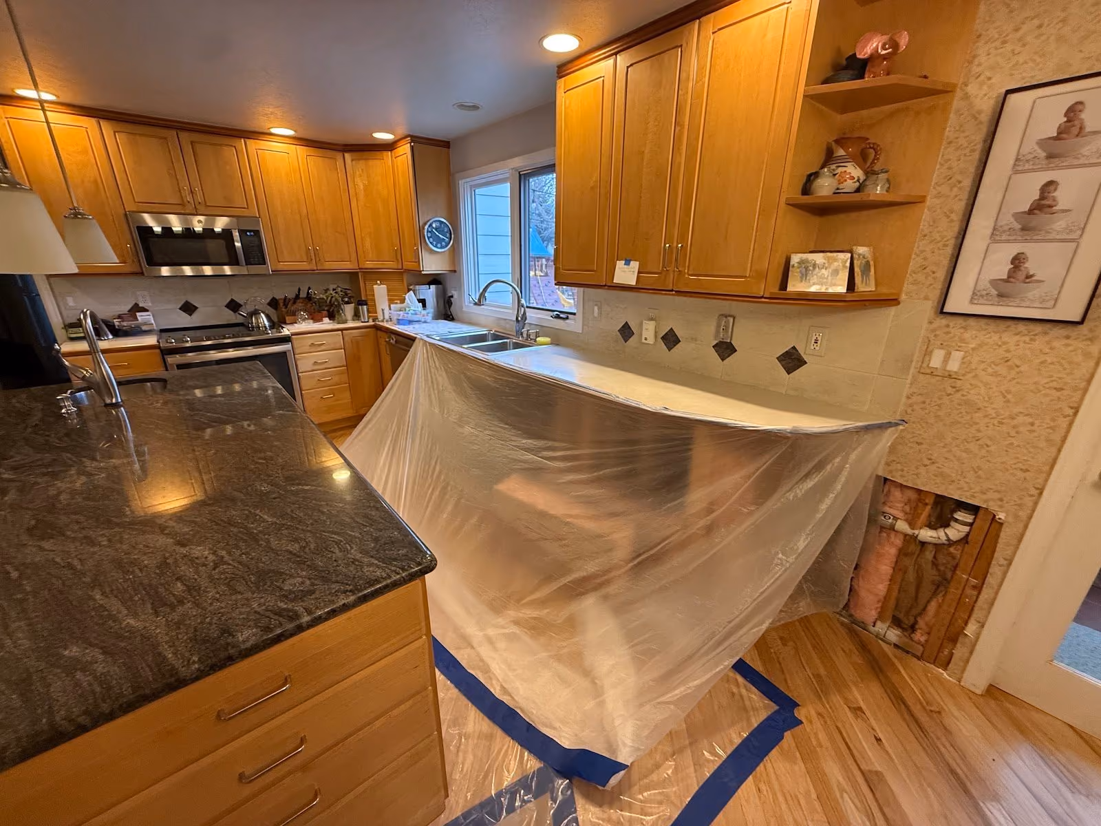 Kitchen wrapped in protective covering