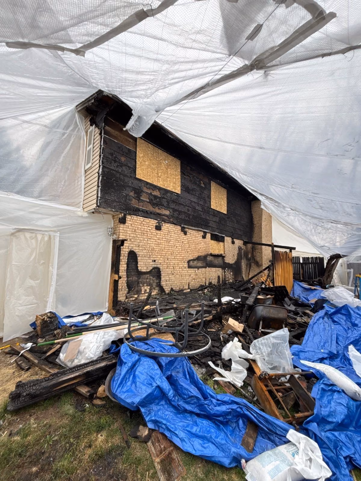 Fire-damaged kitchen before build-back