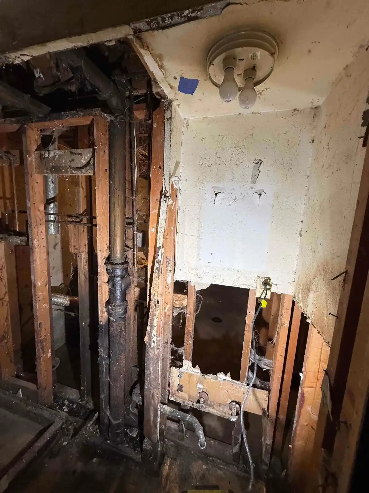 Burst pipe damage in Old Town Park City before restoration