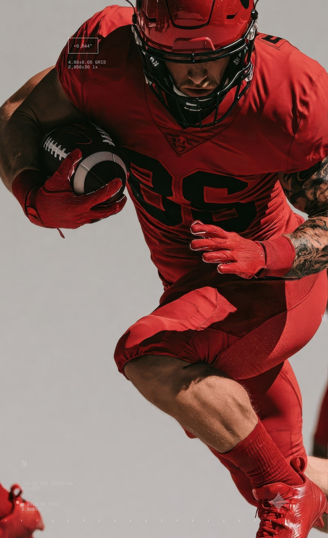 American football player leaping with ball