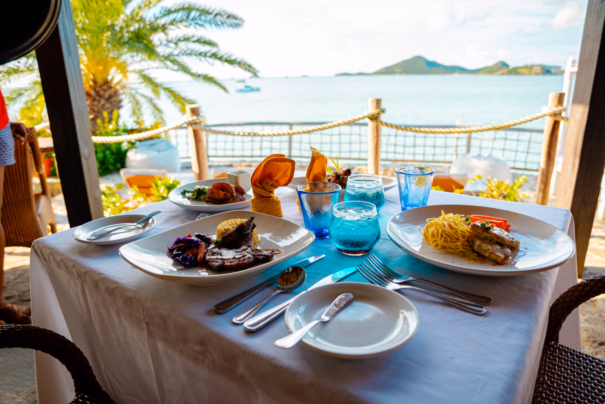 Breakfast served on a veranda overlooking the Caribbean Sea