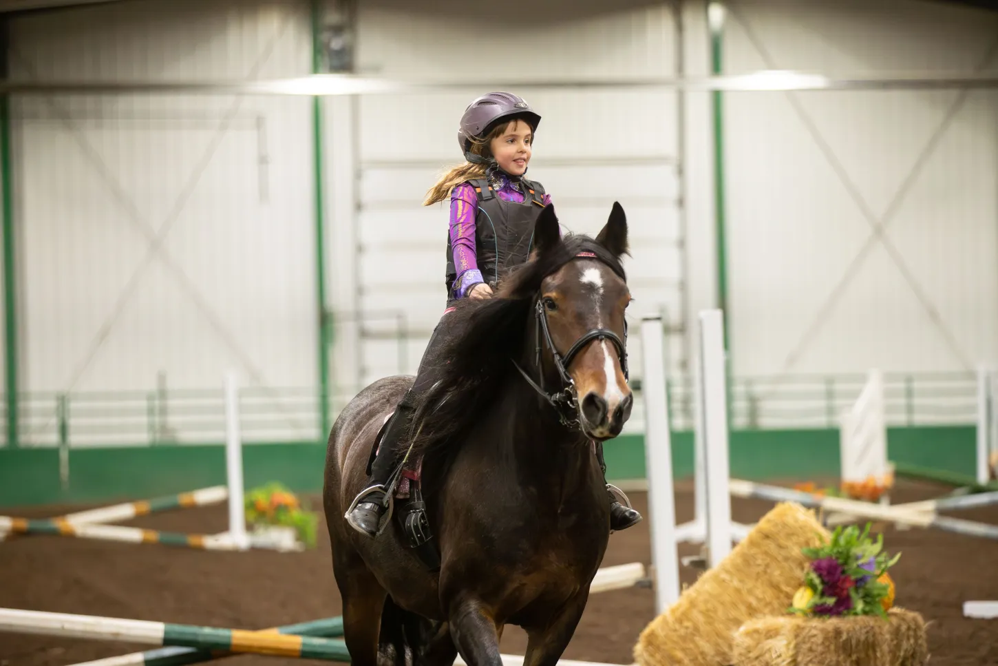 Young rider on horseback at a South Peace Horse Club event