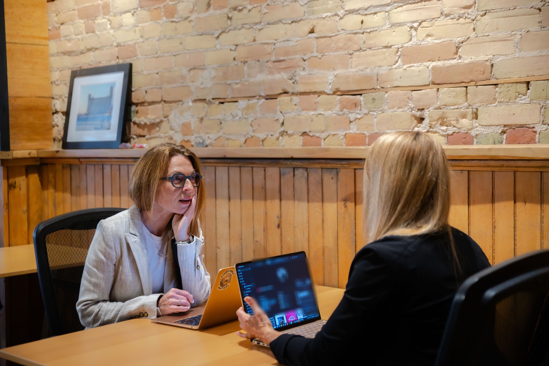 The Metoris founders working together at a desk