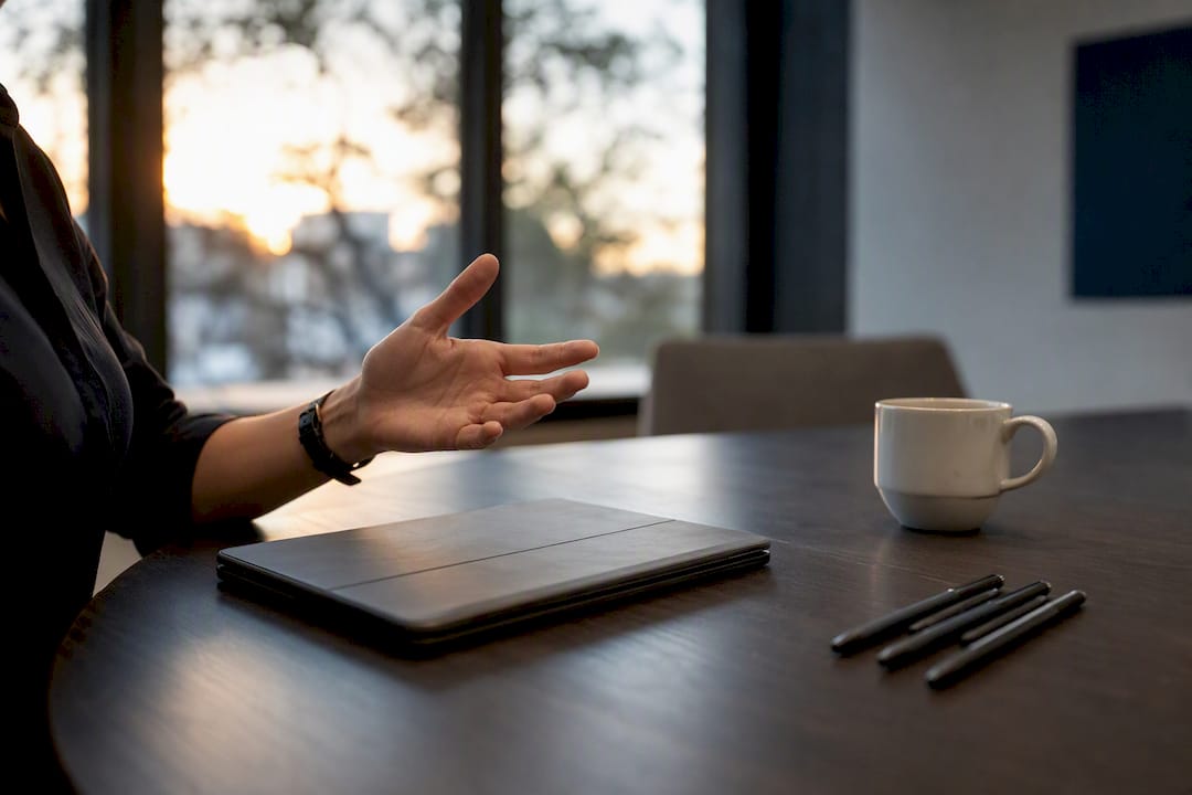 Hand pointing at a tablet in legal training