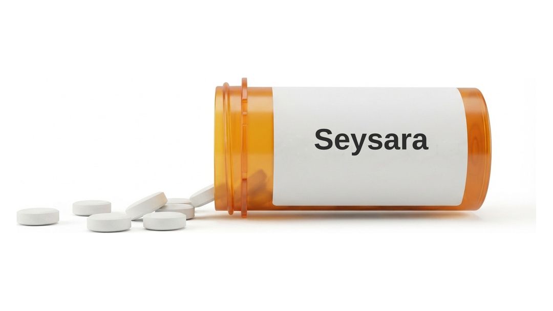 An amber pill bottle labeled Seysara tipped over with white tablets spilling out