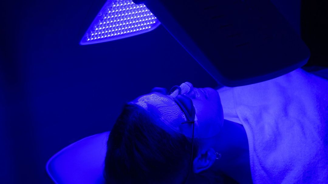 16:9 hero for Blue Light Therapy. Never cropped: the tone strip and the corner logo depend on the full frame.