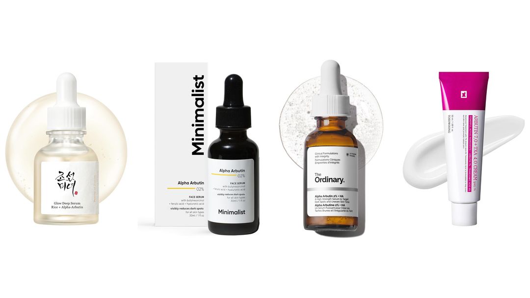 Four alpha arbutin products lined up on white: three dropper serums and a pink cream tube